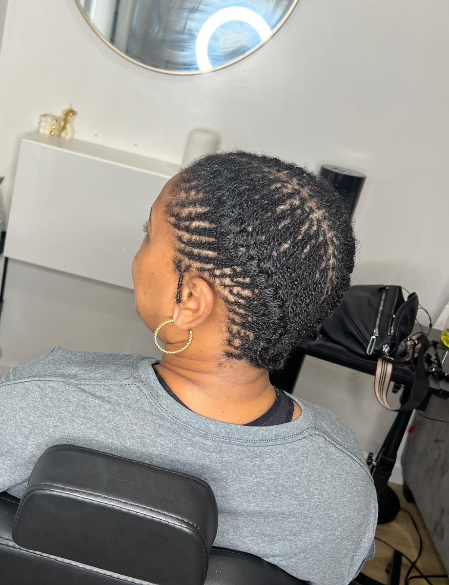 Close-up of natural loc retie sectioning at Locs by Hair Arena